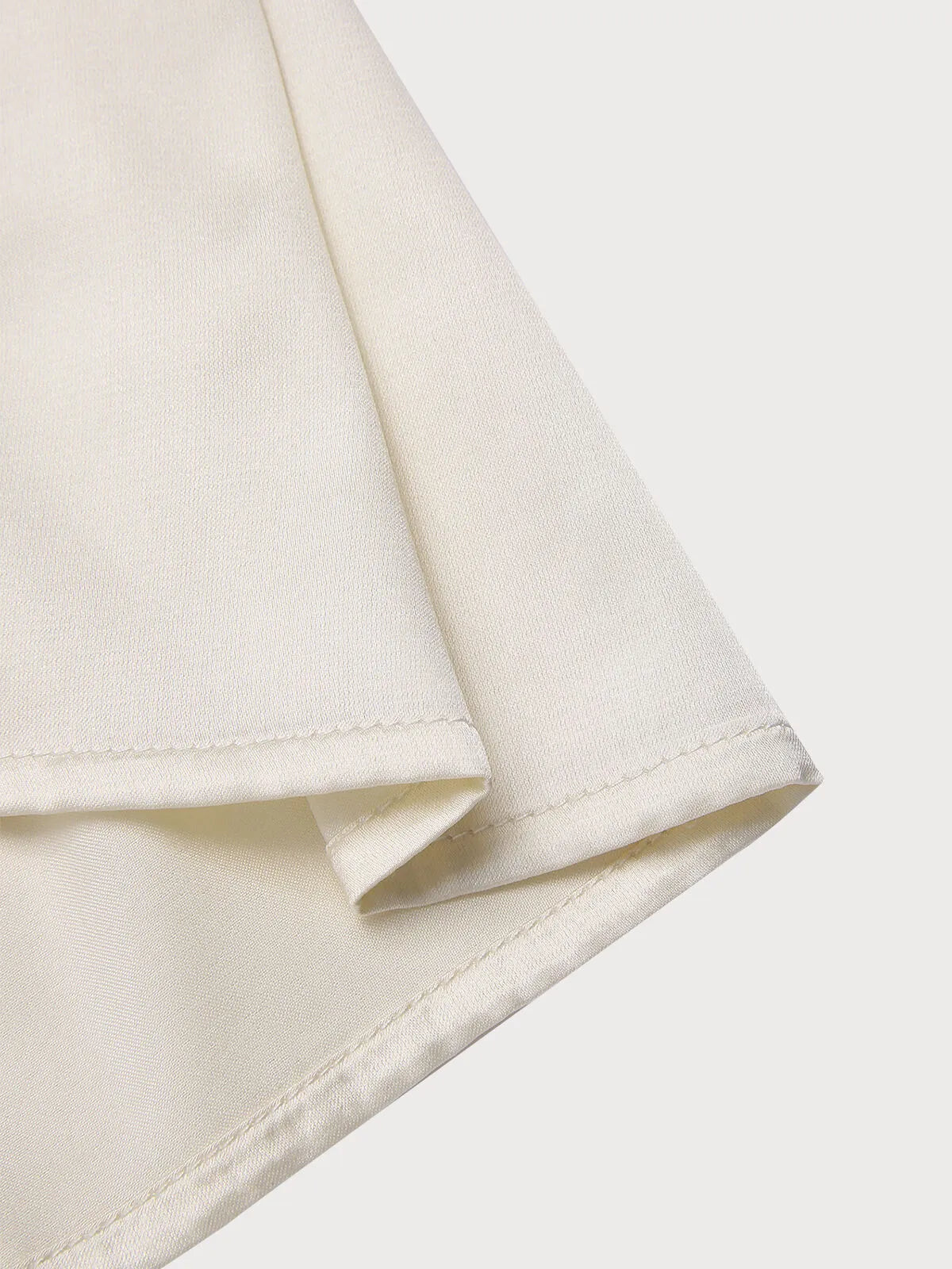 Solid Asymmetrical Round Neck Flare Regular Blouse